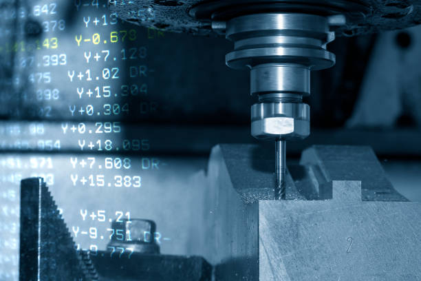 istock Abstract scene CNC milling machine micro cutting the mold parts and G-code data background. 1385735186