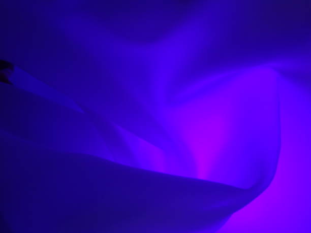 istock Purple silk satin luxury fabric background with copy space  background 1385735694