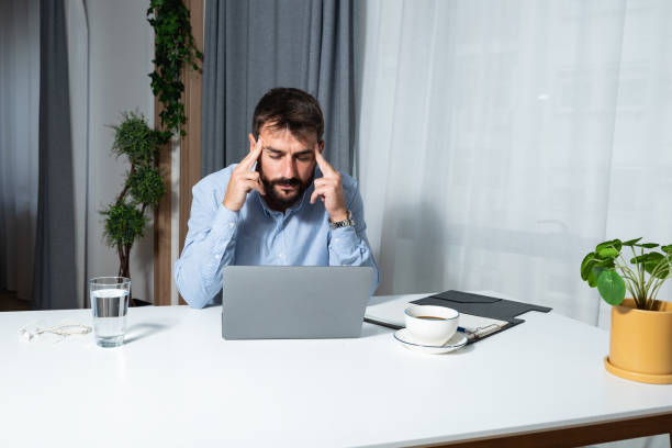 istock Young satisfied expert freelancer business man preparing video call presentation on his laptop with company employees explaining ideas and solutions for successful leadership in the market strategy 1385736732
