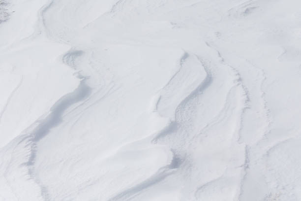 istock ripples in the snow formed by the strong wind from the mountain 1385738136