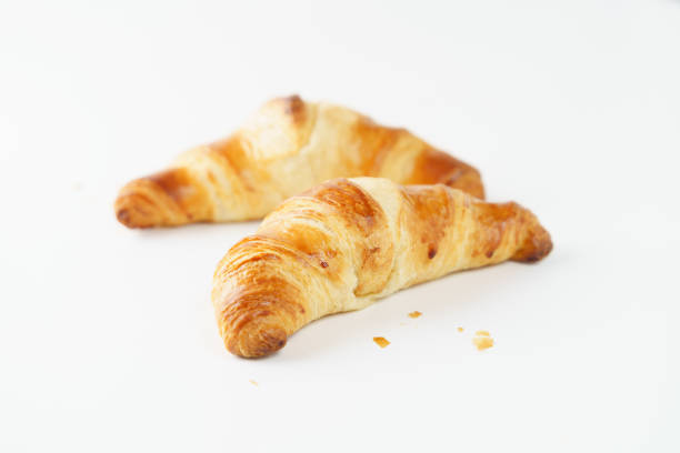 istock Breakfast or lunch concept. Croissants on grey background 1385744619