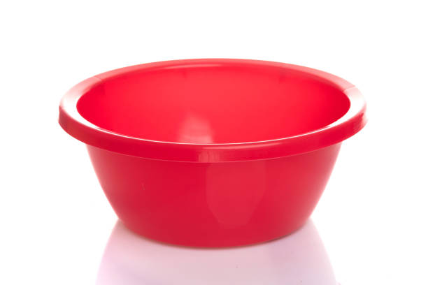 istock empty red household plastic groove on a white isolated background 1385746526