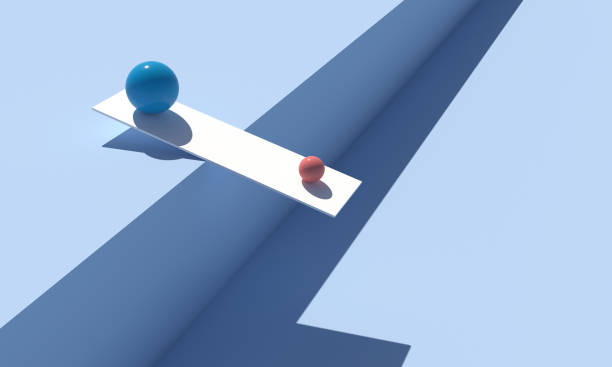 istock Balls balancing on the edge 1385747717
