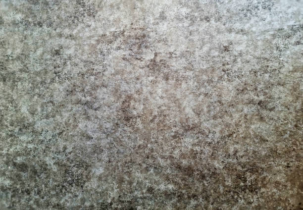istock abstract grunge patina effect, antique brown rust texture. trendy and chic background with blank space for design. grunge concrete interior wallpaper with elegant mottled dark and light. 1385748192