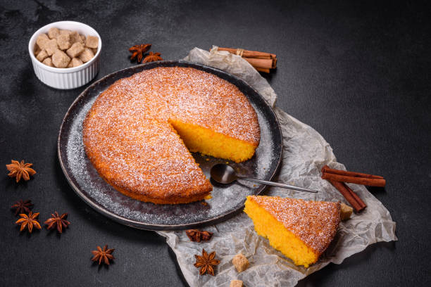 istock Pumpkin pie on marble cutting board. Dark background. Copy space 1385748643