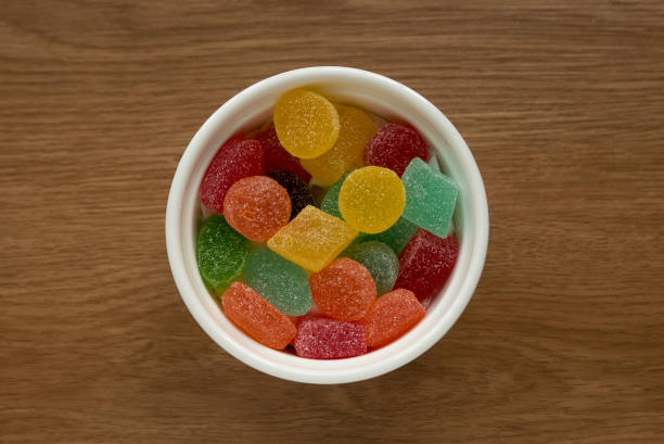 A fruit flavor of colorful sweet candy jelly bites coated with sugar. stock photo
