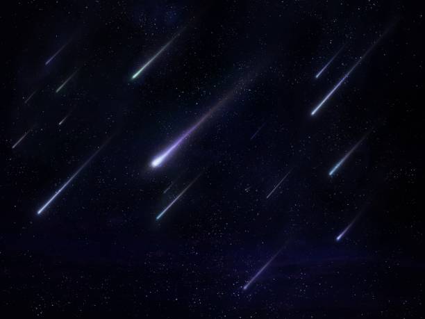 istock Meteor shower in the night sky with stars 1385749263