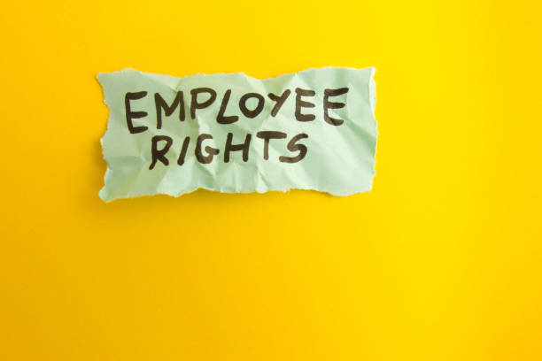 istock Words employee rights handwritten on yellow background 1385750539
