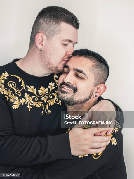 Portrait Of Lgbtq Male Couple In Matching Outfits Stock Photo - Download Image Now - LGBTQIA People, LGBTQIA Rights, Dating