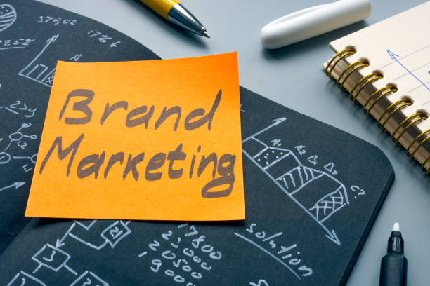 istock Brand marketing memo on the open notepad. 1385751630