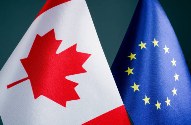 Close up of flags of Canada and EU Europe Union. stock photo