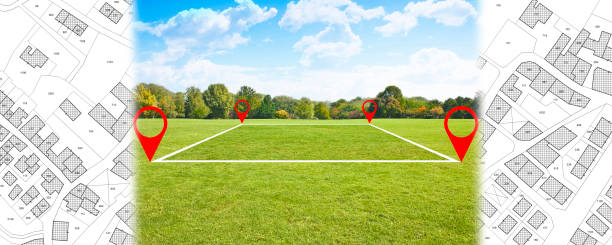 istock Land plot management - real estate concept with a vacant land on a green field available for building construction in a residential area and imaginary cadastral map 1385753477