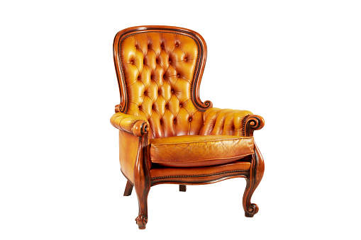 Vintage style luxury leather armchair seat isolated on the white background with clipping path