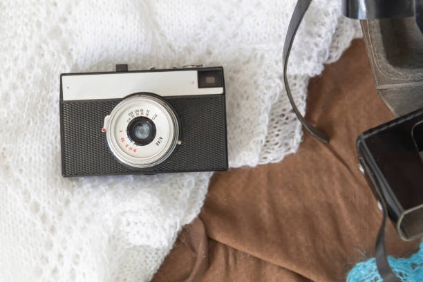 istock Old things folded in a retro suitcase for travel. 1385755006