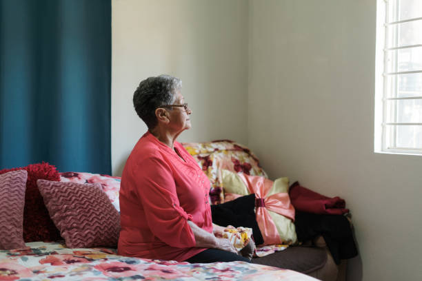 istock Thoughtful senior woman at her room 1385761739