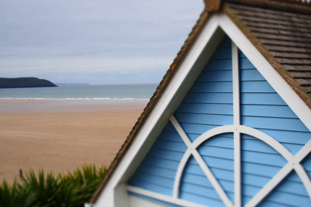 istock Blue and white timber clad beach hut 1385762301