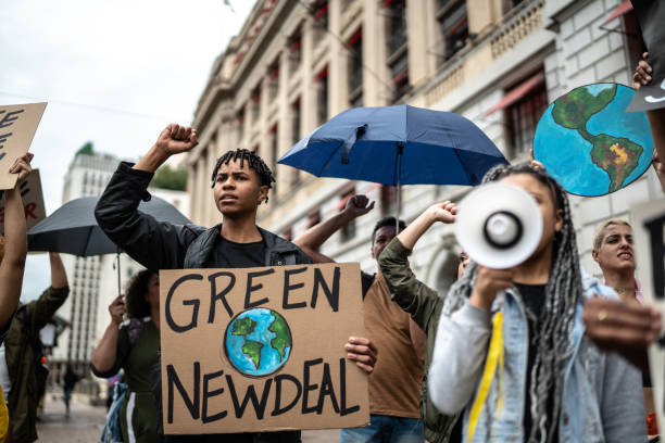 istock Protests holding signs during on a demostration for environmentalism 1385766508