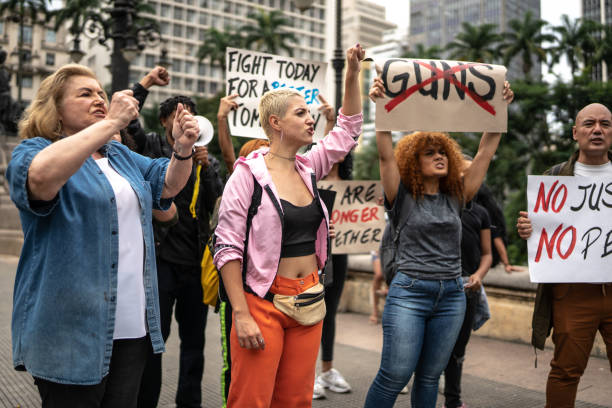 istock Protests holding signs during on a demonstration for peace 1385767083