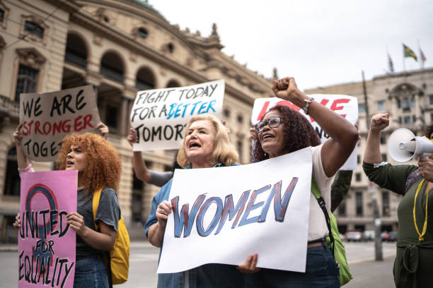 istock Protests holding signs during on a demonstration for equal rights 1385767096