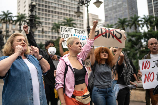 istock Protests holding signs during on a demonstration for peace 1385767120