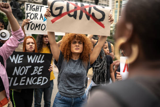 istock Protests holding signs during on a demonstration for peace 1385767124