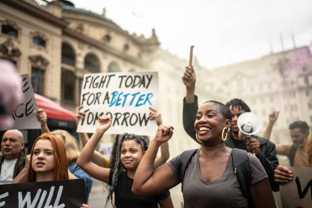 istock Protests holding signs during on a demonstration outdoors 1385767143