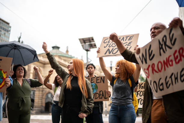 istock Protests holding signs during on a demonstration outdoors 1385767396