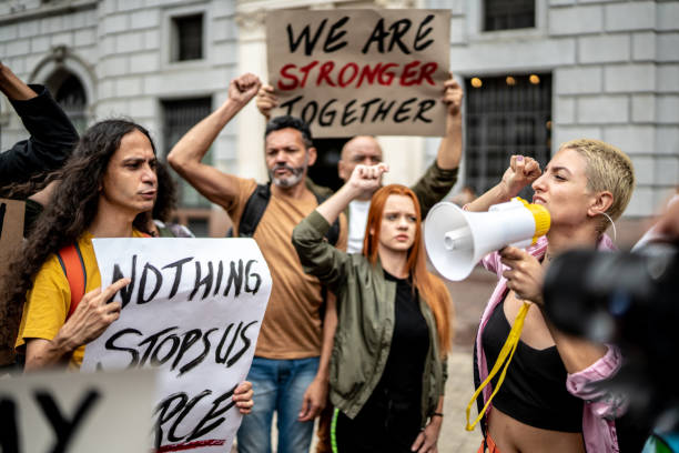 istock Protests holding signs during on a demonstration outdoors 1385767472