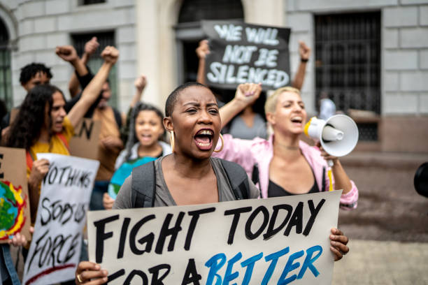 Activists doing a demonstration outdoors
