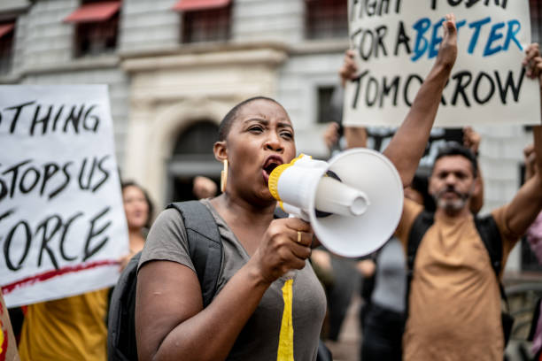 istock Activists doing a demonstration outdoors 1385767512