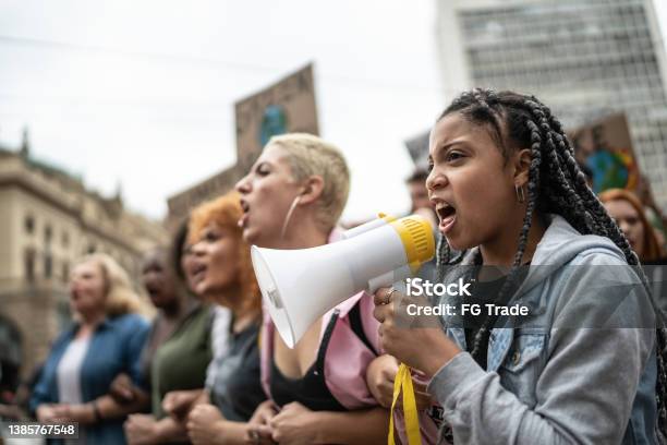 Protests Doing A Demonstration Stock Photo - Download Image Now - Protest, Teenager, Strike - Protest Action