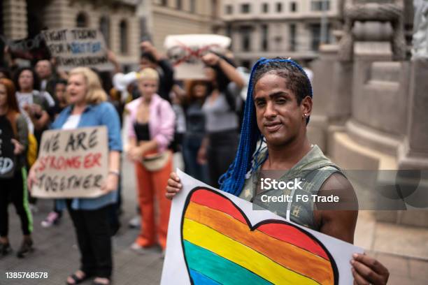 Transgender Woman Holding A Sign During A Demonstration In The Street Stock Photo - Download Image Now
