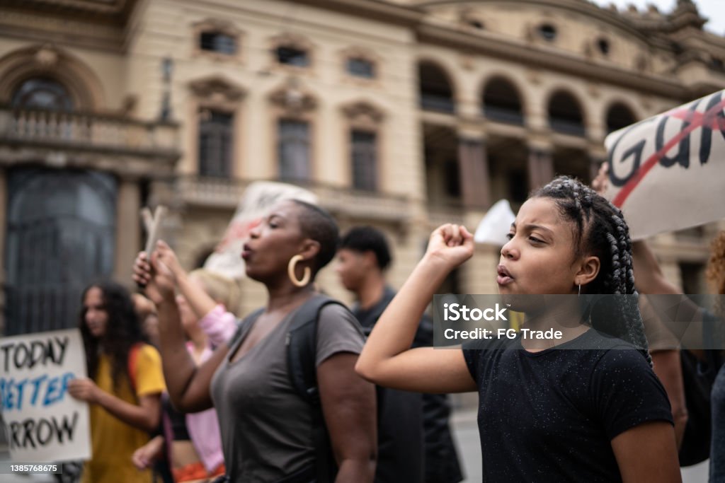 Protesters during a demonstration in the street Protest Stock Photo
