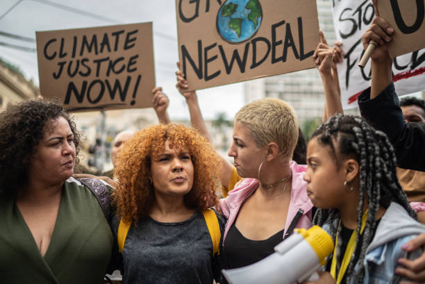 istock Protesters during a demonstration in the street 1385769304