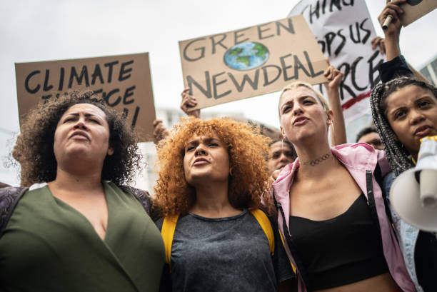 istock Protesters during a demonstration in the street 1385769313