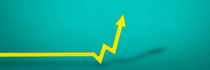Inflation. Rising inflation. Global financial crisis. Yellow arrow on the graph indicating price growth, blue background