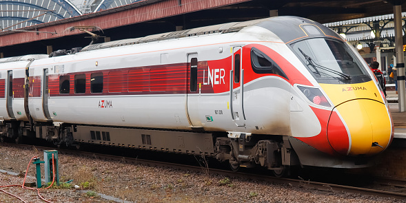 York, United Kingdom - 11 March, 2022: LNER Azuma Train (801208 at the rear) on service for Edinburgh.