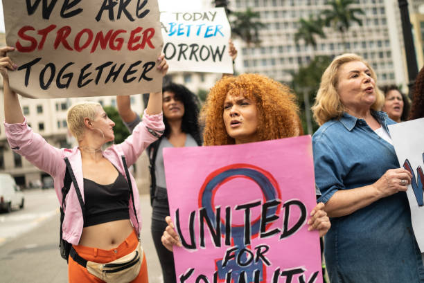 istock Women on a demonstration for equal rights 1385771171
