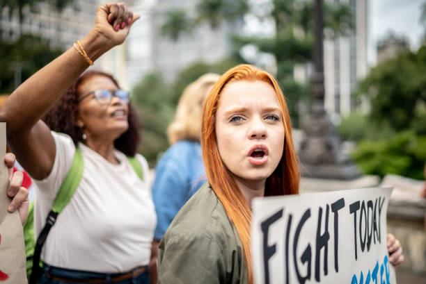 istock Woman on a demonstration for equal rights 1385771249
