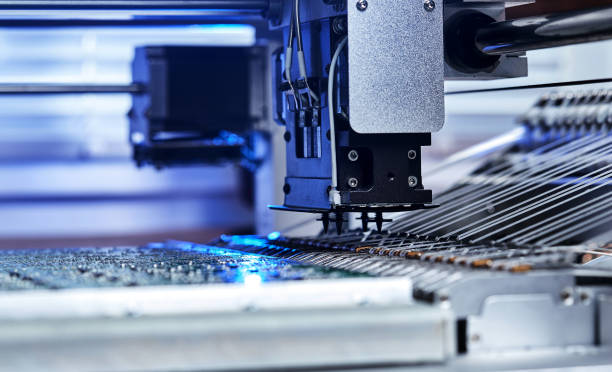 istock Machine (robot) for the production of computer boards. Electronic chips. Robotic High precision equipment. Microchip Production, Nano computer Technology and manufacturing technological process 1385771362