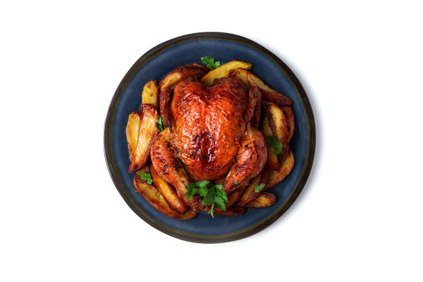 istock Fried whole chicken, with potatoes, on a white background, no people. 1385780138