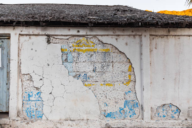 istock Plaster peeling off a wall on the Baja peninsula. 1385785127