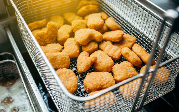 Deep fryers and grill, equipment of a fast food restaurant Deep fryers and grill, equipment of a fast food restaurant deep fryer stock pictures, royalty-free photos & images