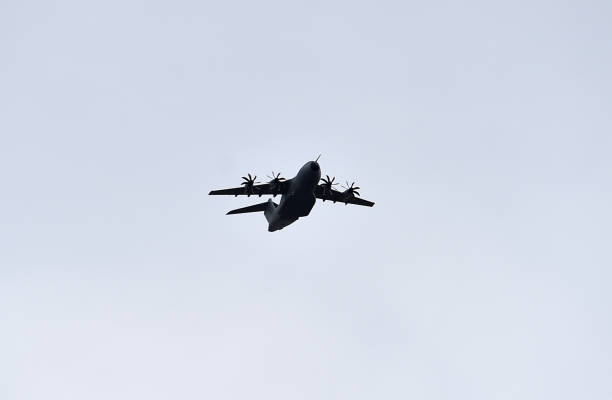 istock a military transport plane flying 1385786773