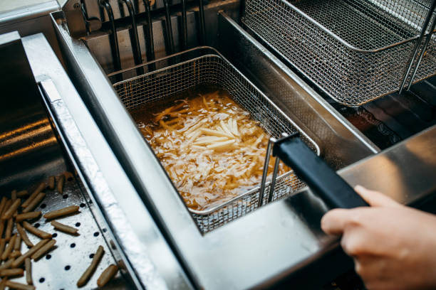 istock Deep fryer for potatoes in kitchen 1385786820