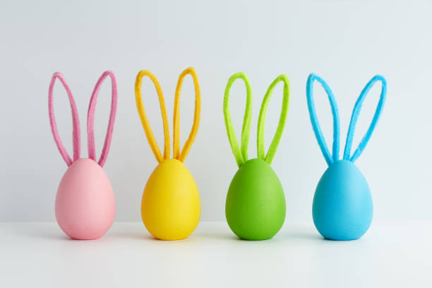 istock Colorful Easter eggs with bunny ears, holiday decoration 1385788438