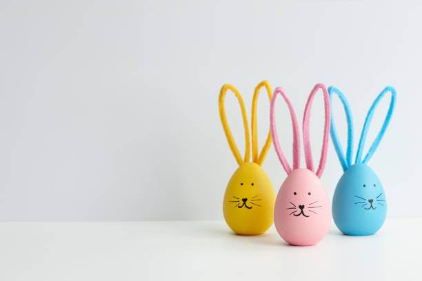 istock Colorful Easter eggs with bunny faces, holiday decoration 1385788463