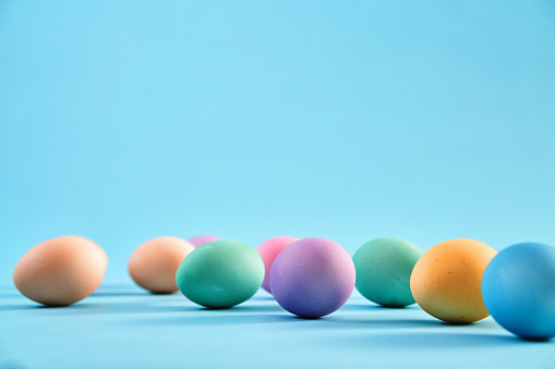 Easter Decoration with Easter Eggs on Blue Background