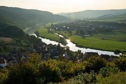 Beautiful view over the villages of Rühle and Pegestorf on both sides of the Weser river, Weser Uplands, Lower Saxony, Germany