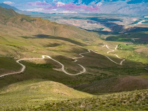 Photo of The winding gravel road from Humauca to the Serranía de Hornocal viewpoint, Jujuy province, Northern Argentina